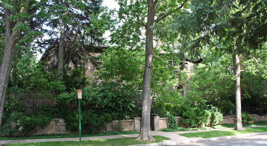 Professional roofing contractor installing new roof on residential home
